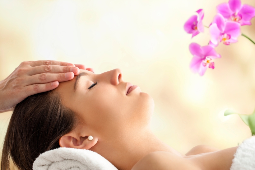 Female Facial massage in spa.